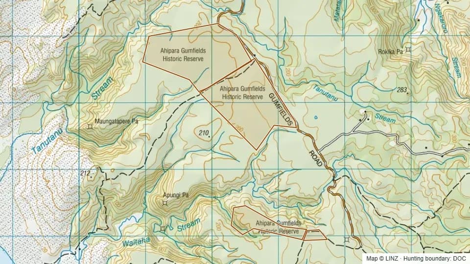 Topographic map of Ahipara Gumfields Historic Reserve in Northland, New Zealand, with the DOC hunting boundary outlined.
