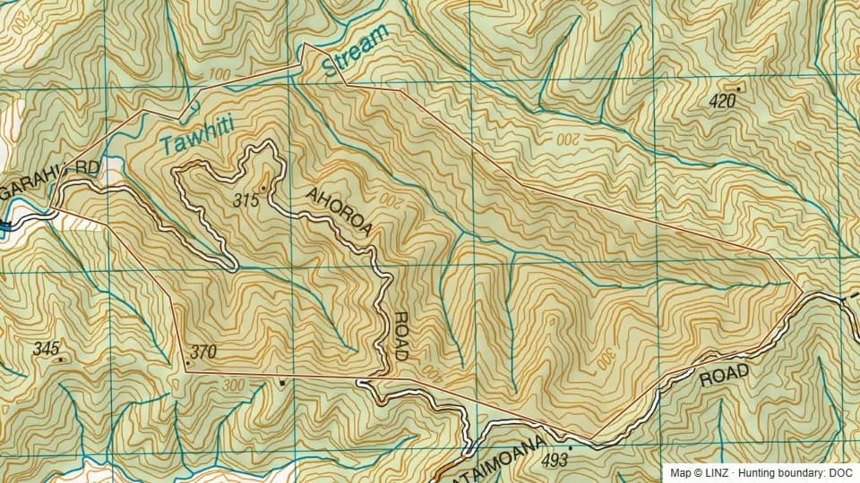 Topographic map of Ahoroa Scenic Reserve in Taranaki, New Zealand, with the DOC hunting boundary outlined.