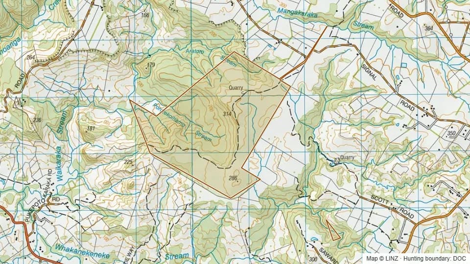 Topographic map of Aratoro Conservation Area in Northland, New Zealand, with the DOC hunting boundary outlined.