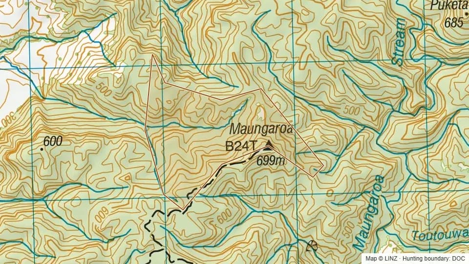 Topographic map of Carvers Block (Pt Taheke C. A.) in Manawatu-Wanganui, New Zealand, with the DOC hunting boundary outlined.