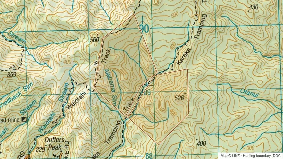 Topographic map of Conservation Area - Karaka in Waikato, New Zealand, with the DOC hunting boundary outlined.