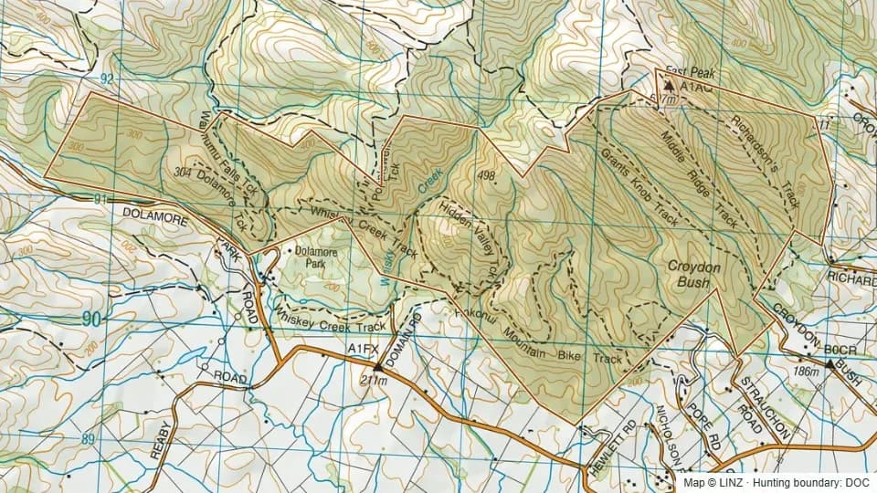 Topographic map of Croydon Bush Scenic Reserve in Southland, New Zealand, with the DOC hunting boundary outlined.