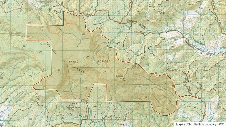 Topographic map of Kaihu Forest in Northland, New Zealand, with the DOC hunting boundary outlined.
