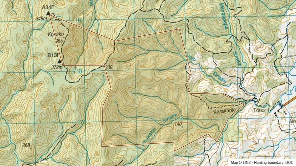 Topographic map of Karakariki Scenic Reserve in Waikato, New Zealand, with the DOC hunting boundary outlined.