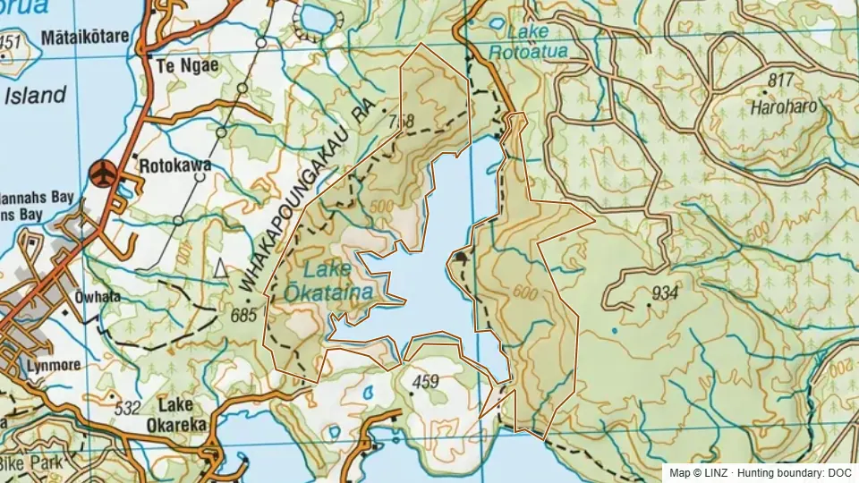 Topographic map of Lake Okataina Scenic Reserve in Bay of Plenty, New Zealand, with the DOC hunting boundary outlined.