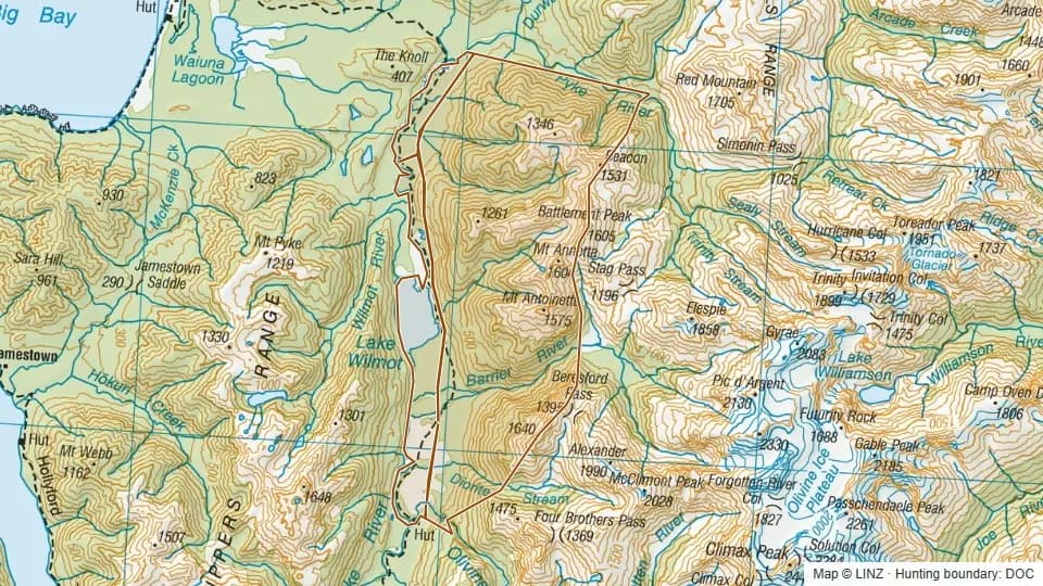 Topographic map of Lake Wilmot East in Southland, New Zealand, with the DOC hunting boundary outlined.
