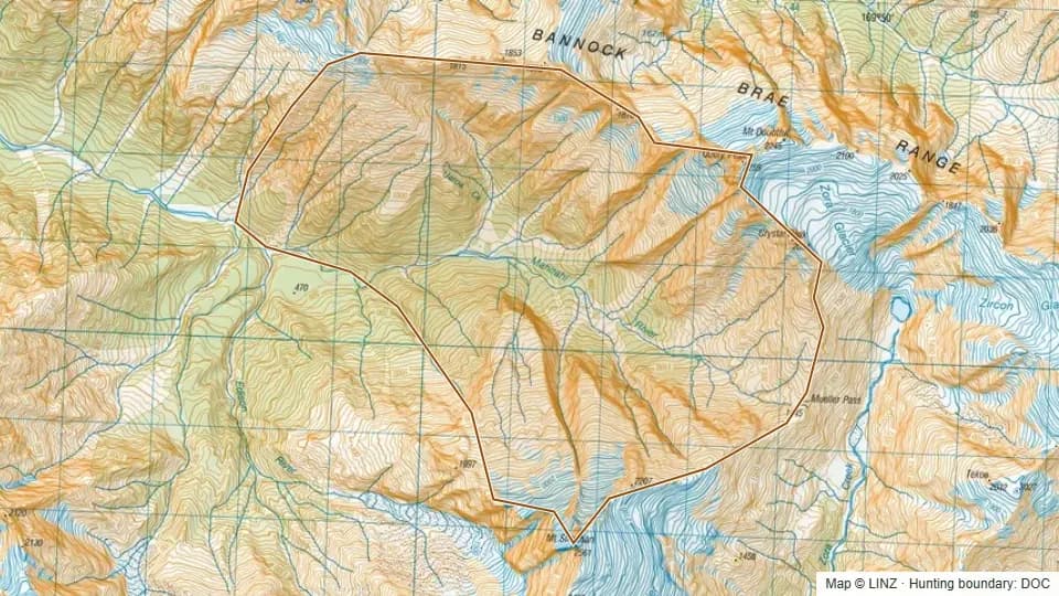 Topographic map of Mahitahi Lower in West Coast, New Zealand, with the DOC hunting boundary outlined.