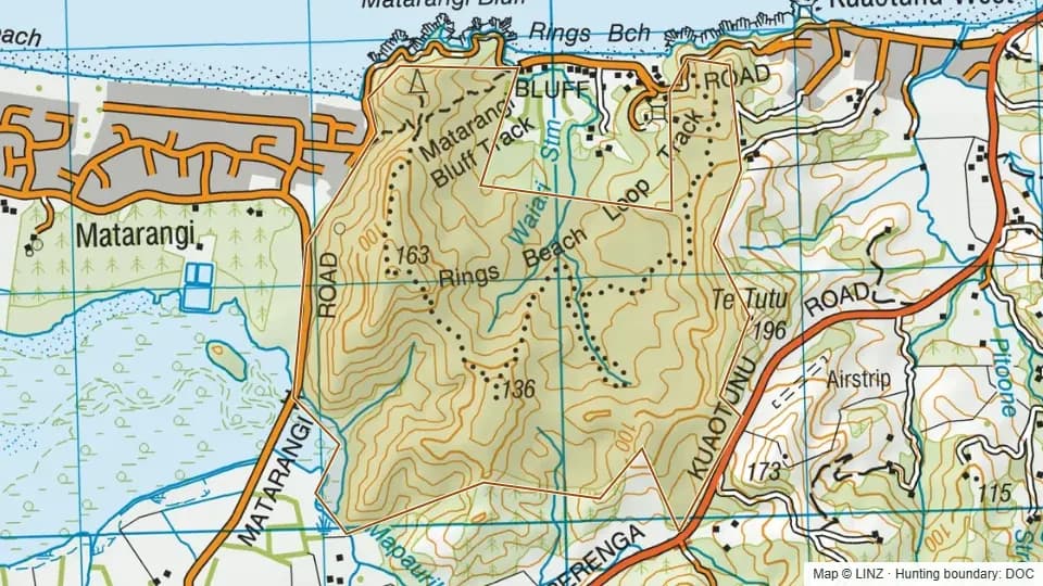 Topographic map of Matarangi Bluff Scenic Reserve in Waikato, New Zealand, with the DOC hunting boundary outlined.