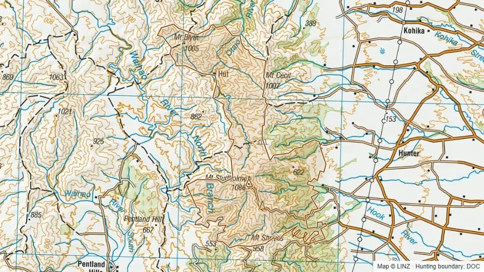 Topographic map of Mount Studholme/ Kaiwarua in Canterbury, New Zealand, with the DOC hunting boundary outlined.