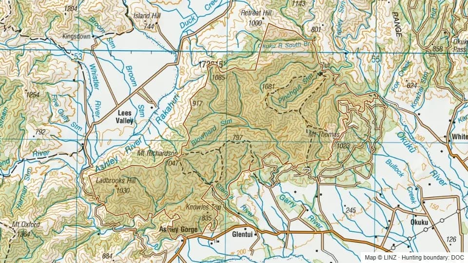 Topographic map of Mt Thomas Forest in Canterbury, New Zealand, with the DOC hunting boundary outlined.