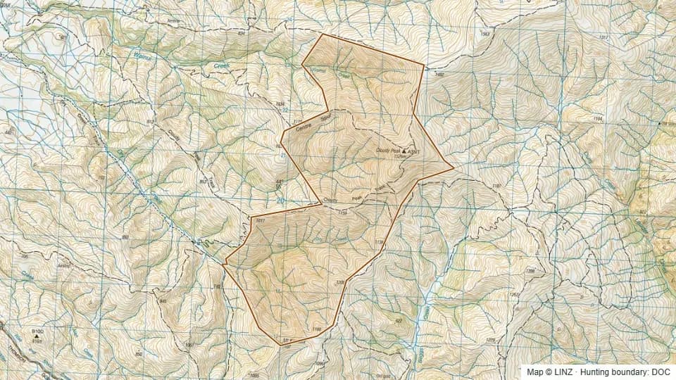 Topographic map of Neinei I Kura in Otago, New Zealand, with the DOC hunting boundary outlined.