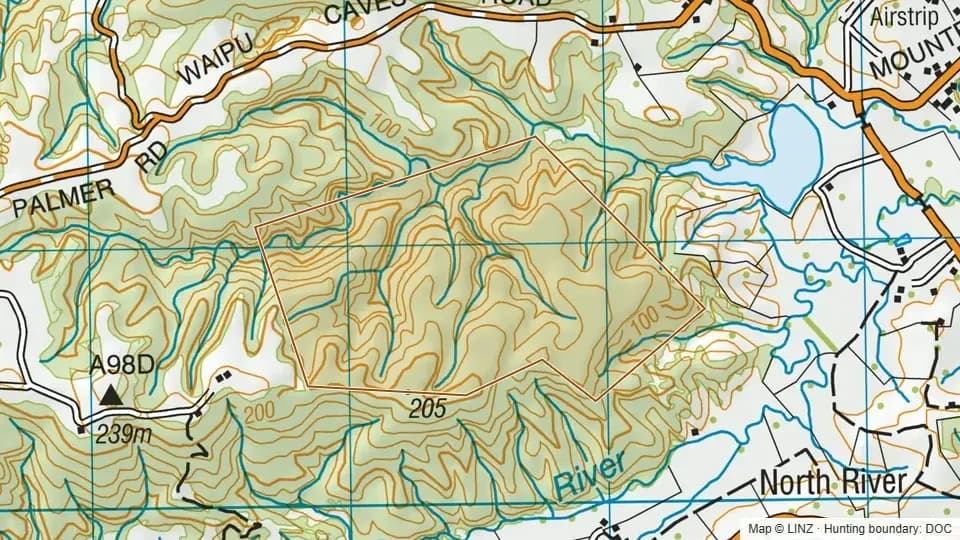 Topographic map of North River Scenic Reserve in Northland, New Zealand, with the DOC hunting boundary outlined.
