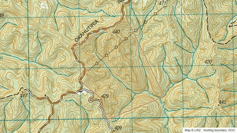Topographic map of Okahutiria Conservation Area in Taranaki, New Zealand, with the DOC hunting boundary outlined.
