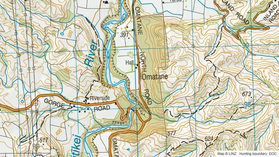 Topographic map of Omatane Scenic Reserve in Manawatu-Wanganui, New Zealand, with the DOC hunting boundary outlined.