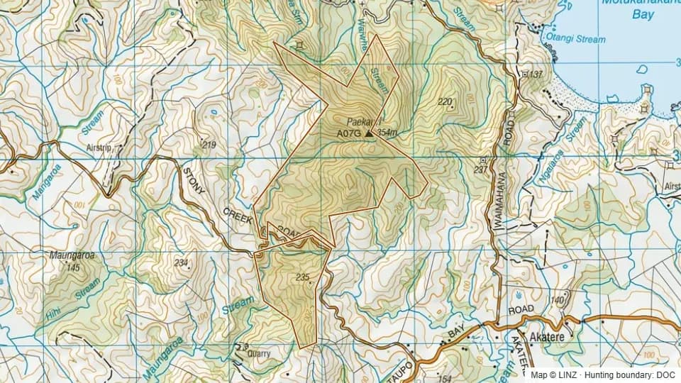 Topographic map of Paikauri Conservation Area in Northland, New Zealand, with the DOC hunting boundary outlined.