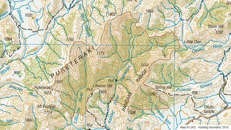 Topographic map of Puketeraki in Canterbury, New Zealand, with the DOC hunting boundary outlined.
