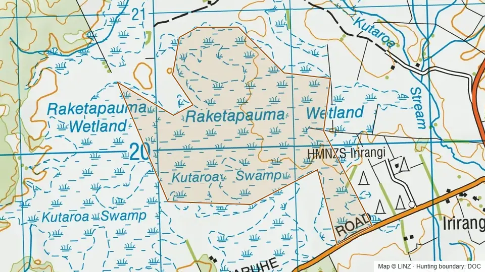 Topographic map of Raketapauma Swamp Scenic Reserve in Manawatu-Wanganui, New Zealand, with the DOC hunting boundary outlined.