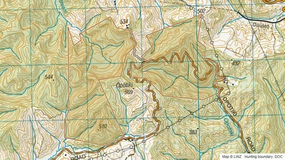 Topographic map of Rangi Scenic Reserve in Manawatu-Wanganui, New Zealand, with the DOC hunting boundary outlined.