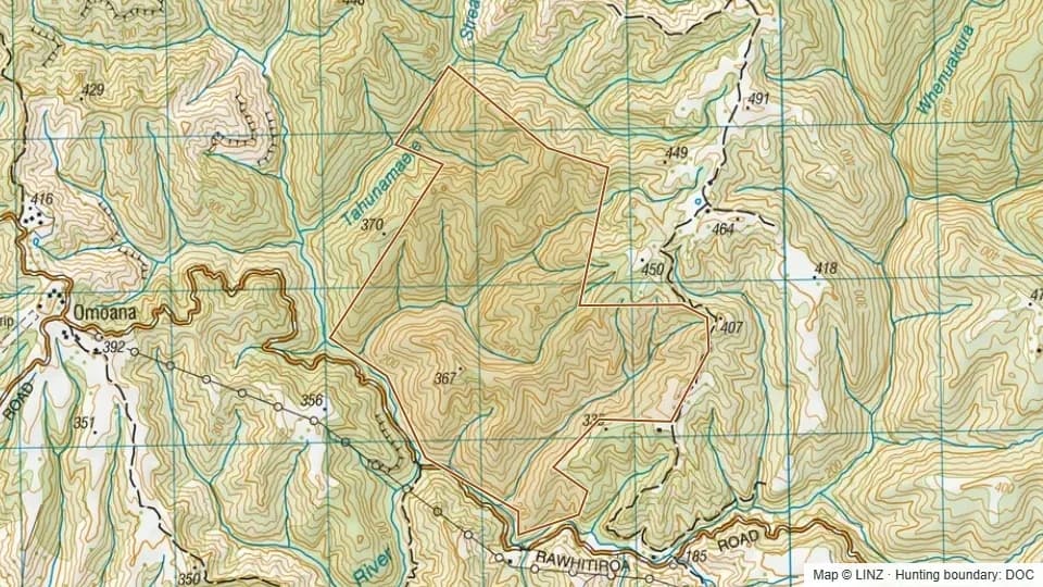 Topographic map of Rawhitiroa Road Conservation Area in Taranaki, New Zealand, with the DOC hunting boundary outlined.
