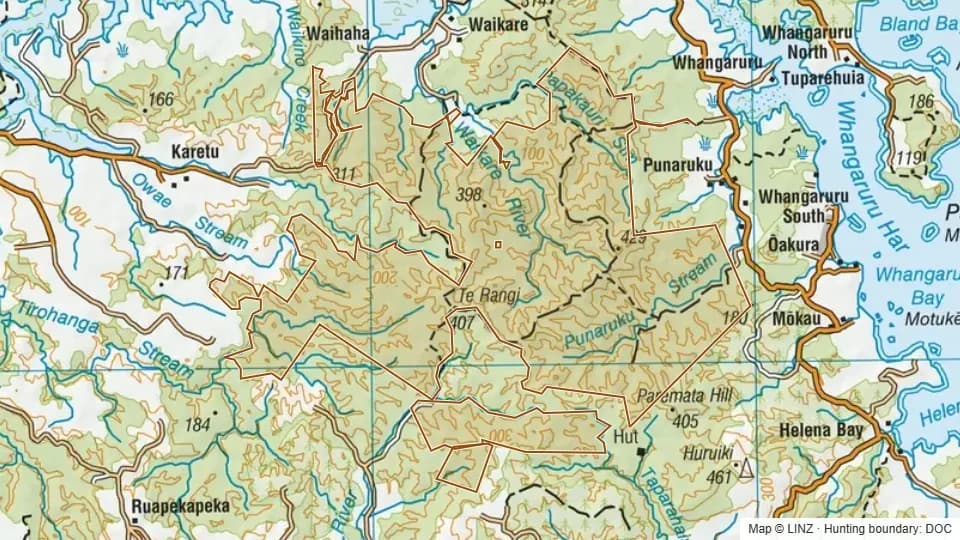Topographic map of Russell Forest in Northland, New Zealand, with the DOC hunting boundary outlined.
