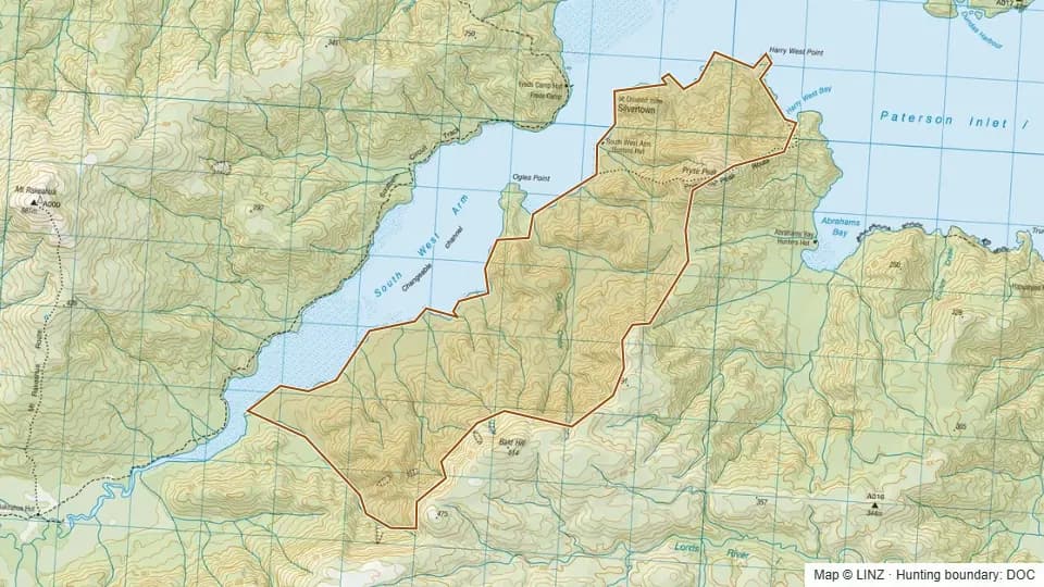 Topographic map of South West Arm in Southland, New Zealand, with the DOC hunting boundary outlined.