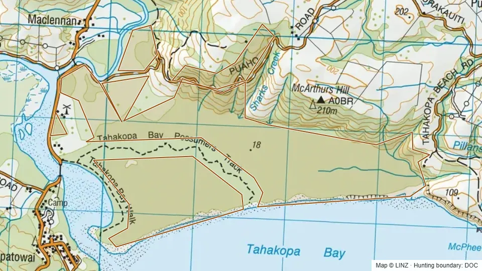 Topographic map of Tahakopa Bay in Otago, New Zealand, with the DOC hunting boundary outlined.