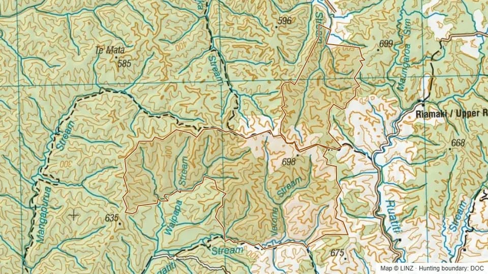 Topographic map of Taheke Conservation Area (Pt) in Manawatu-Wanganui, New Zealand, with the DOC hunting boundary outlined.