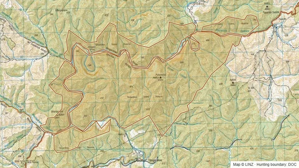 Topographic map of Tangarakau Scenic Reserve in Manawatu-Wanganui, New Zealand, with the DOC hunting boundary outlined.