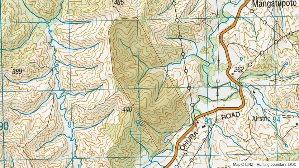 Topographic map of Tangitu Scenic Reserve in Manawatu-Wanganui, New Zealand, with the DOC hunting boundary outlined.