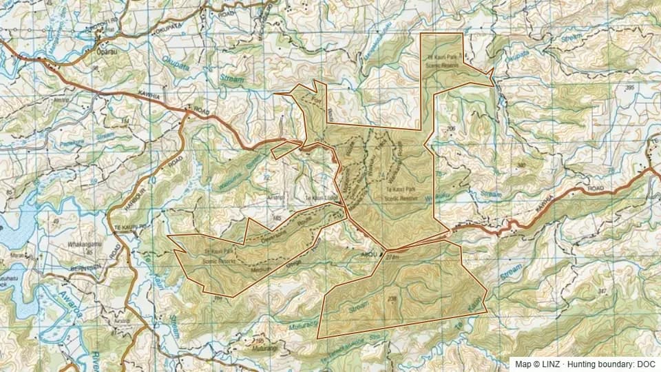 Topographic map of Te Kauri Park Scenic Reserve in Waikato, New Zealand, with the DOC hunting boundary outlined.