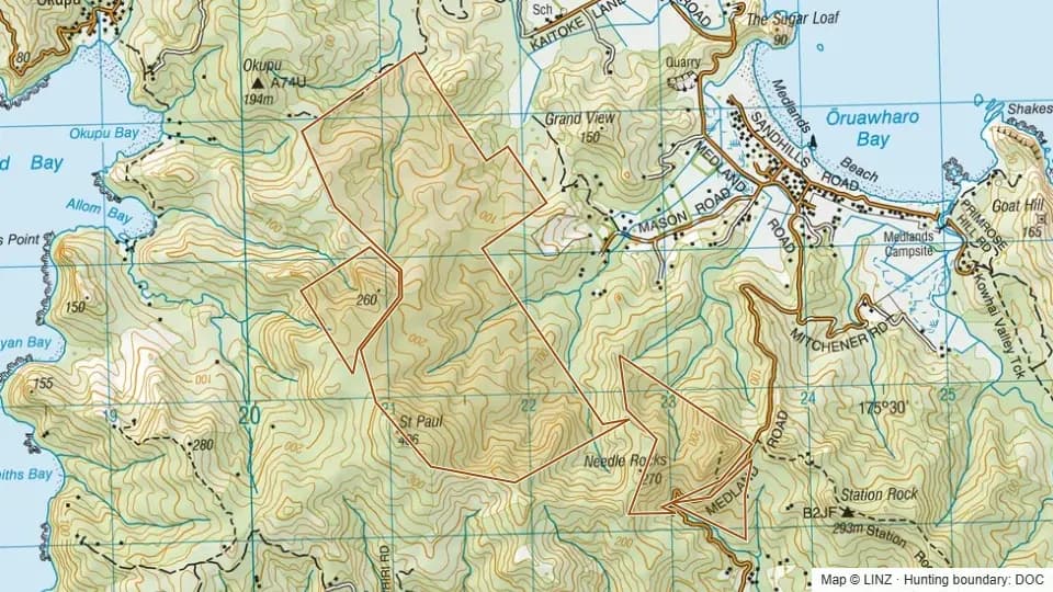 Topographic map of Tryphena Scenic Reserve in Auckland, New Zealand, with the DOC hunting boundary outlined.