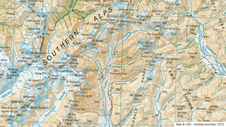 Topographic map of Upper Godley in Canterbury, New Zealand, with the DOC hunting boundary outlined.