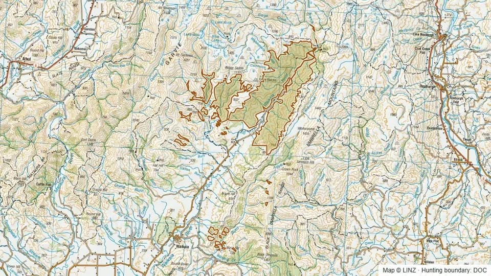 Topographic map of Waikaia Forest in Southland, New Zealand, with the DOC hunting boundary outlined.