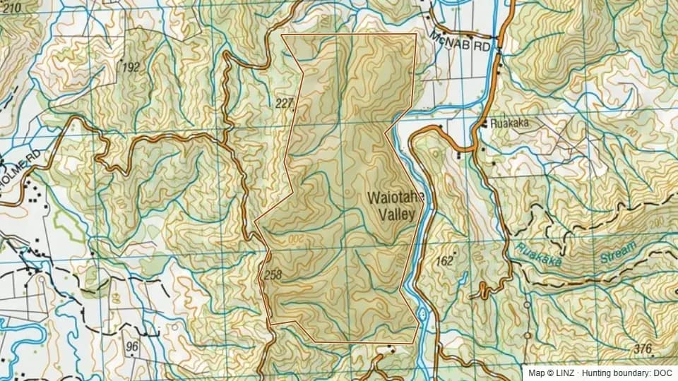 Topographic map of Waiotahi Scenic Reserve in Bay of Plenty, New Zealand, with the DOC hunting boundary outlined.