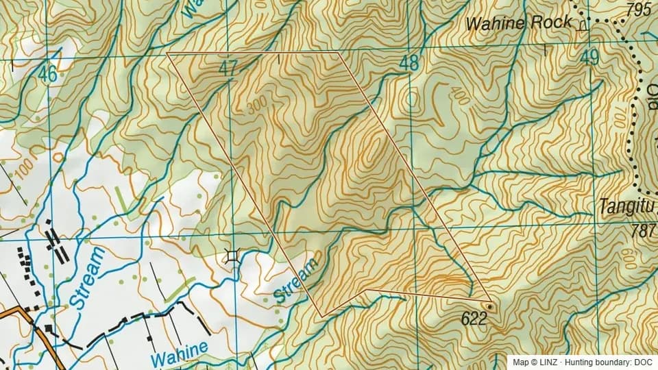 Topographic map of Wairakau Scenic Reserve in Waikato, New Zealand, with the DOC hunting boundary outlined.