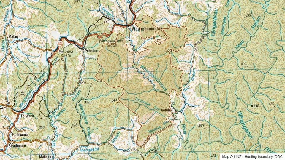 Topographic map of Whangamomona Conservation Area in Manawatu-Wanganui, New Zealand, with the DOC hunting boundary outlined.