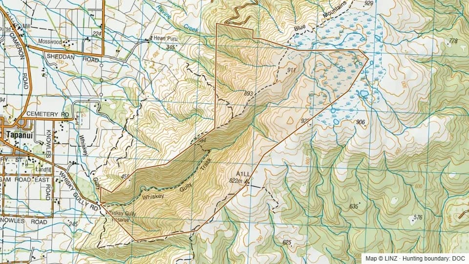 Topographic map of Whisky - Blue Mountains in Otago, New Zealand, with the DOC hunting boundary outlined.