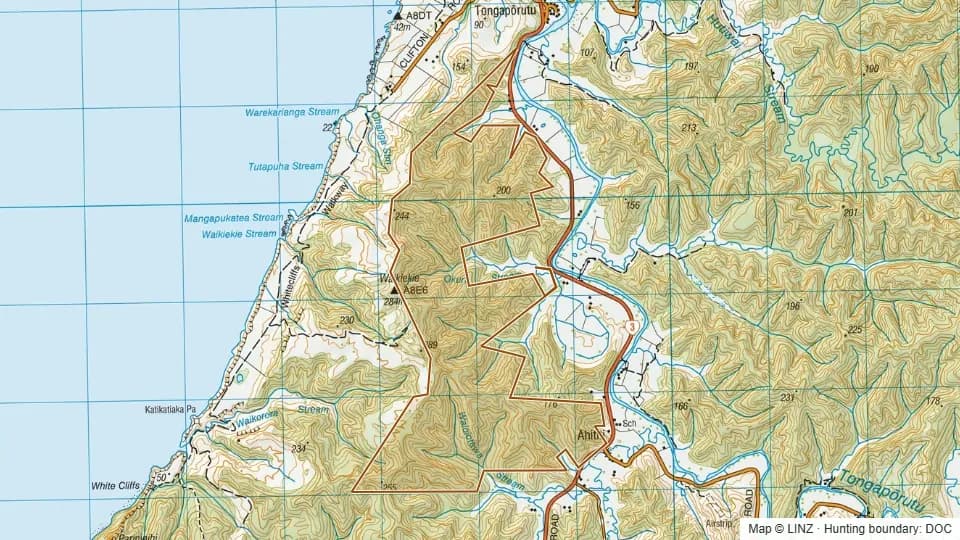 Topographic map of Whitecliffs Conservation Area in Taranaki, New Zealand, with the DOC hunting boundary outlined.
