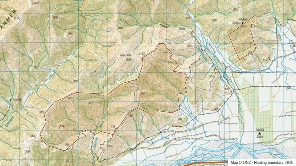 Topographic map of Woodbank in Canterbury, New Zealand, with the DOC hunting boundary outlined.
